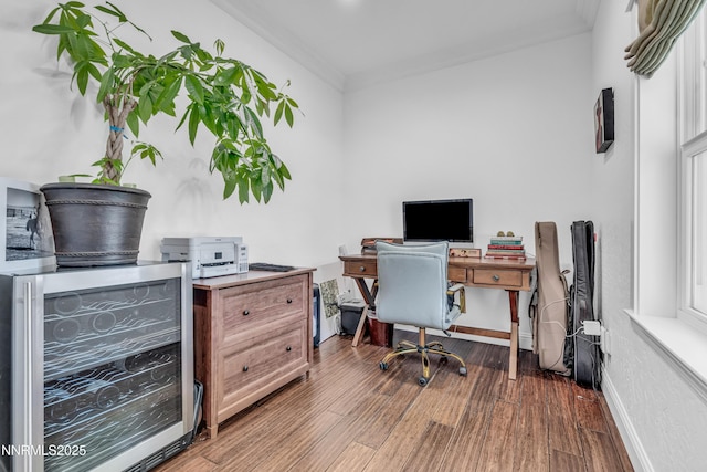 600 Artemesia Ln, Gardnerville, NV 89460 - office with ornamental molding, wine cooler, and dark wood-style flooring