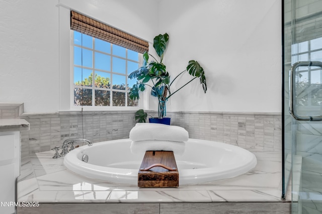 600 Artemesia Ln, Gardnerville, NV 89460 - full bathroom featuring a bath and wainscoting