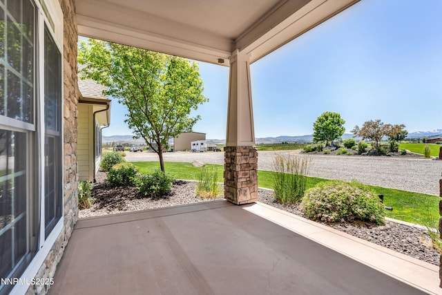 600 Artemesia Ln, Gardnerville, NV 89460 - porch with a mountain view and a patio