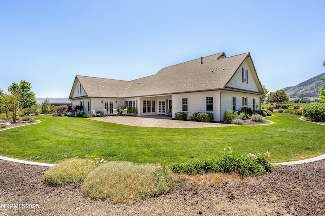 600 Artemesia Ln, Gardnerville, NV 89460 - rear view of property with a lawn, french doors, and roof with shingles