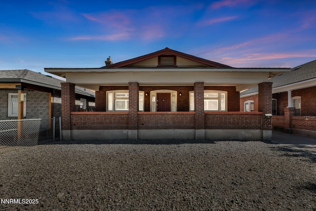 911 F St, Sparks, NV 89431 - view of front facade with a porch and brick siding