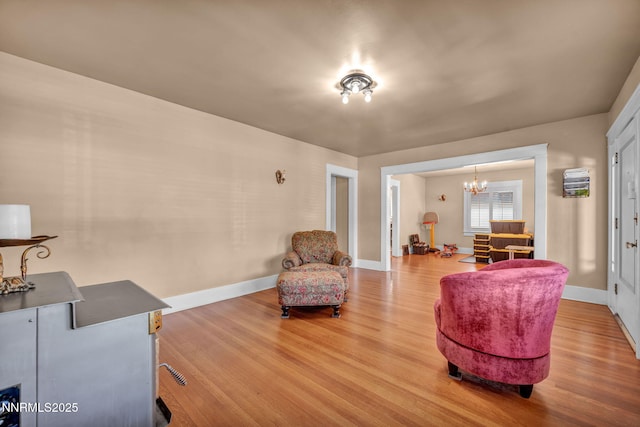 911 F St, Sparks, NV 89431 - living area with a chandelier and wood finished floors
