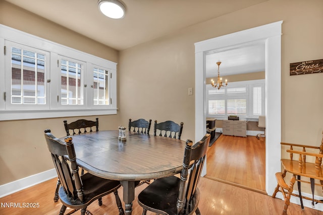911 F St, Sparks, NV 89431 - dining room featuring a chandelier and wood finished floors