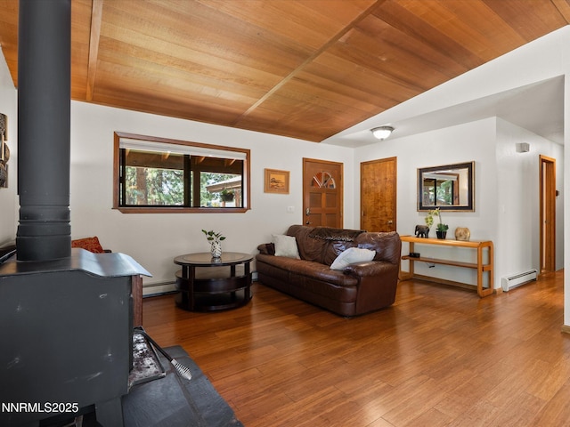 139 Rosewood Cir, Stateline, NV 89449 - living area featuring wooden ceiling, baseboard heating, wood finished floors, lofted ceiling, and a wood stove