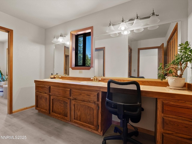 139 Rosewood Cir, Stateline, NV 89449 - bathroom featuring wood finished floors and double vanity