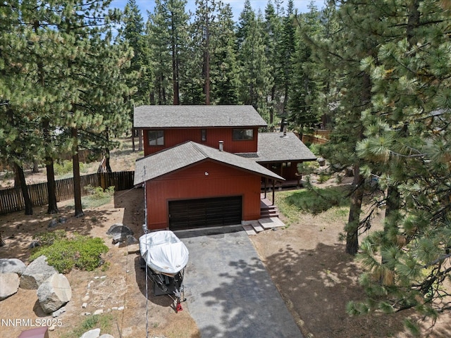 139 Rosewood Cir, Stateline, NV 89449 - view of front facade with driveway, roof with shingles, and a garage