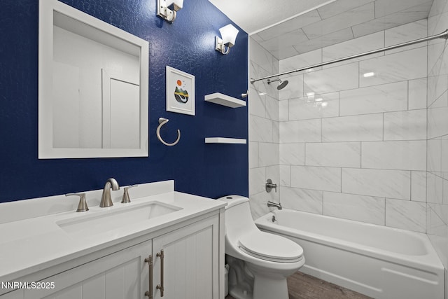 807 Alder Ave Unit 14, Incline Village, NV 89451 - bathroom featuring vanity, shower / bathtub combination, wood finished floors, and a textured wall
