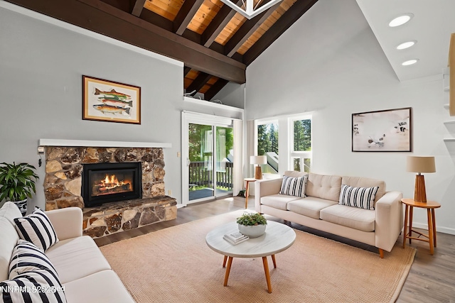 807 Alder Ave Unit 14, Incline Village, NV 89451 - living area with wood finished floors, a wooden ceiling with exposed beams, a fireplace, and high vaulted ceiling