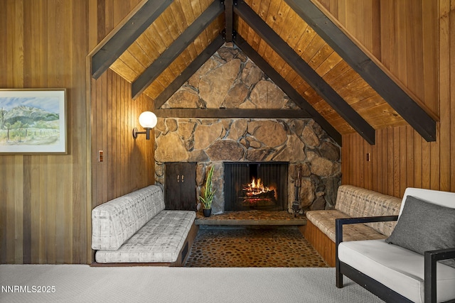 4275 Juniper Creek Rd, Reno, NV 89519 - sitting room featuring wood ceiling, wooden walls, a fireplace, and carpet