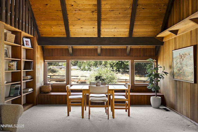 4275 Juniper Creek Rd, Reno, NV 89519 - dining space featuring carpet floors, wood walls, and wood ceiling