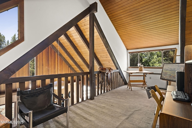 4275 Juniper Creek Rd, Reno, NV 89519 - sitting room with a wooden ceiling with exposed beams, carpet flooring, and high vaulted ceiling
