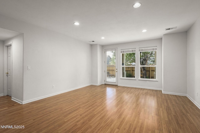 4833 Ramcreek Trl, Reno, NV 89519 - unfurnished room featuring recessed lighting and wood finished floors