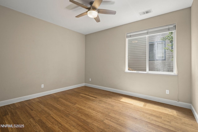 4833 Ramcreek Trl, Reno, NV 89519 - spare room featuring ceiling fan and wood finished floors