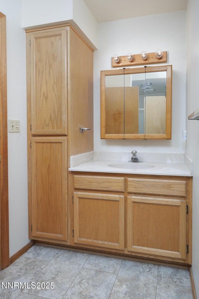 4625 Schurz Hwy, Fallon, NV 89406 - bathroom featuring vanity and baseboards