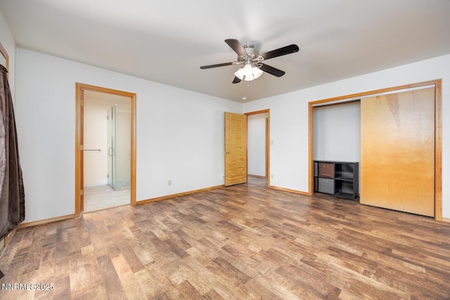 4625 Schurz Hwy, Fallon, NV 89406 - unfurnished bedroom with wood finished floors, ceiling fan, and a closet