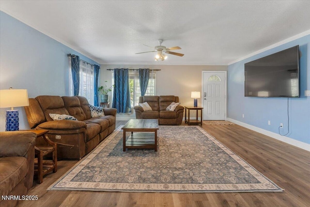 18324 Dustin Ct, Reno, NV 89508 - living room featuring ceiling fan, ornamental molding, and wood finished floors
