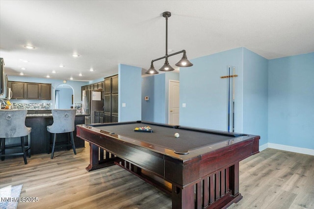 18324 Dustin Ct, Reno, NV 89508 - game room featuring billiards table, light wood-type flooring, arched walkways, and recessed lighting