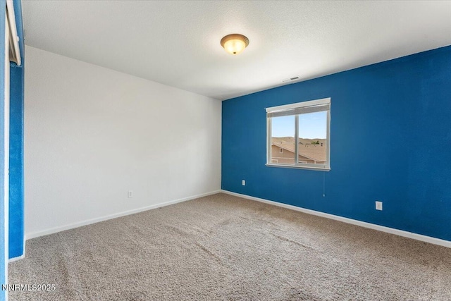 18324 Dustin Ct, Reno, NV 89508 - carpeted spare room with baseboards