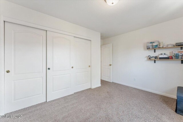 18324 Dustin Ct, Reno, NV 89508 - unfurnished bedroom featuring carpet floors and a closet