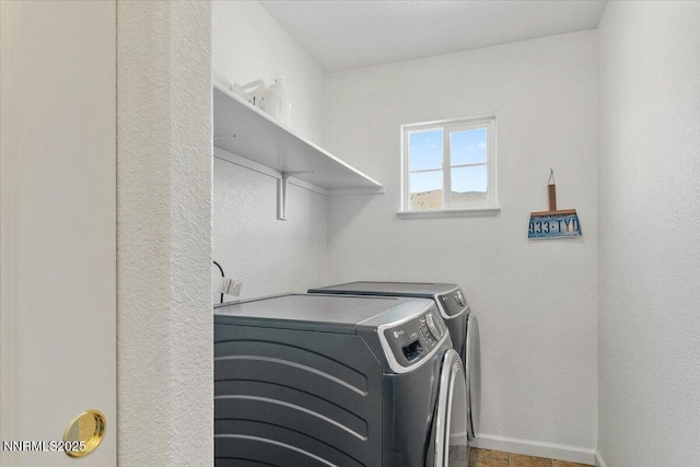 18324 Dustin Ct, Reno, NV 89508 - washroom with washing machine and clothes dryer and baseboards