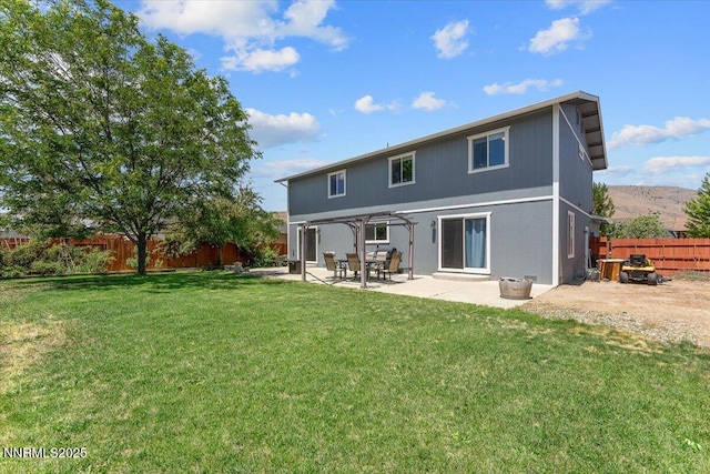 18324 Dustin Ct, Reno, NV 89508 - back of house featuring a fenced backyard, a patio, and a pergola