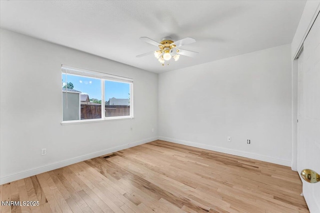 5476 Cabin Ct, Sun Valley, NV 89433 - spare room featuring a ceiling fan and light wood-style floors
