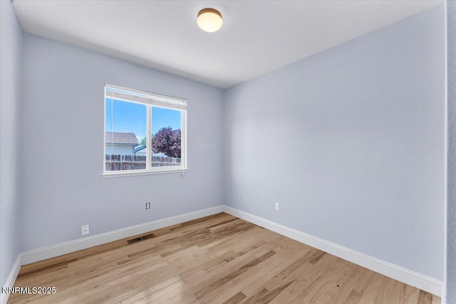 5476 Cabin Ct, Sun Valley, NV 89433 - spare room featuring light wood finished floors and baseboards