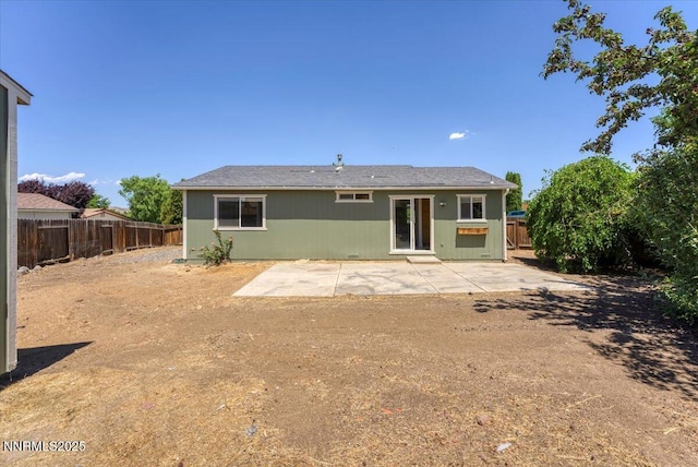 5476 Cabin Ct, Sun Valley, NV 89433 - back of property with a patio area and a fenced backyard