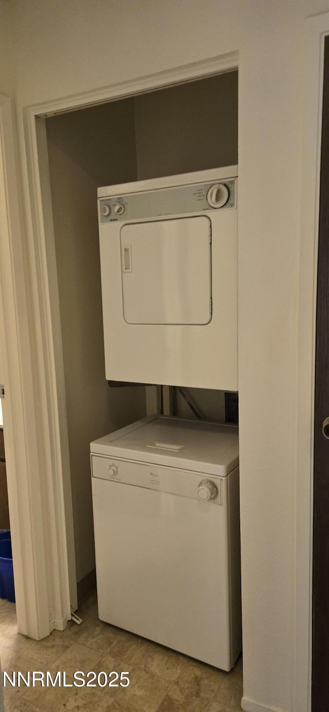 2111 Roundhouse Rd, Sparks, NV 89431 - laundry room featuring stacked washing machine and dryer