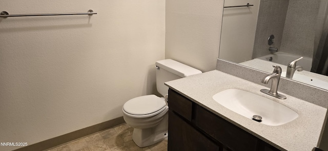 2111 Roundhouse Rd, Sparks, NV 89431 - bathroom featuring vanity, stone finish floors, and a textured wall