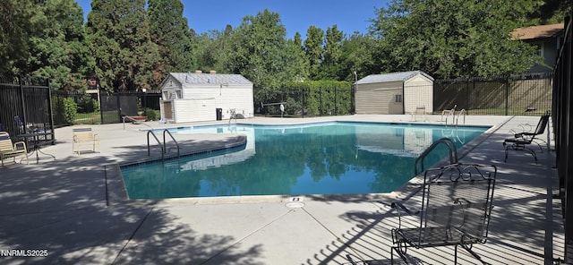 2111 Roundhouse Rd, Sparks, NV 89431 - community pool featuring a storage shed and a patio