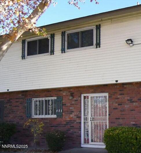 486 Smithridge Park, Reno, NV 89502 - rear view of property with brick siding