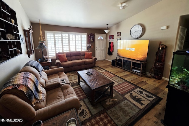 654 Keddie St, Fallon, NV 89406 - living room with hardwood / wood-style flooring and lofted ceiling