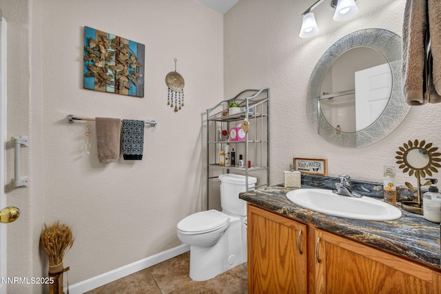 6230 Ingleston Dr Unit 212, Sparks, NV 89436 - bathroom with vanity, tile patterned floors, and a textured wall