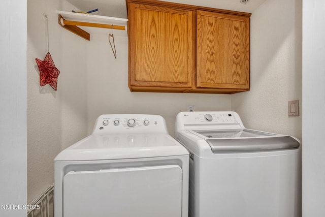 6230 Ingleston Dr Unit 212, Sparks, NV 89436 - laundry room featuring cabinet space and washer and dryer