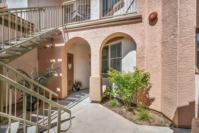 6230 Ingleston Dr Unit 212, Sparks, NV 89436 - entrance to property featuring a balcony and stucco siding