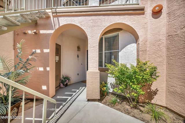 6230 Ingleston Dr Unit 212, Sparks, NV 89436 - doorway to property featuring a balcony and stucco siding