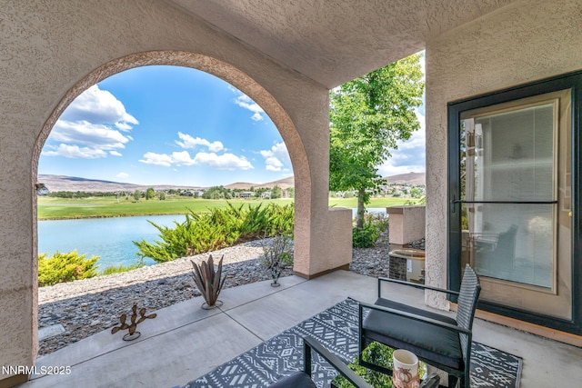 6230 Ingleston Dr Unit 212, Sparks, NV 89436 - view of patio with a water view