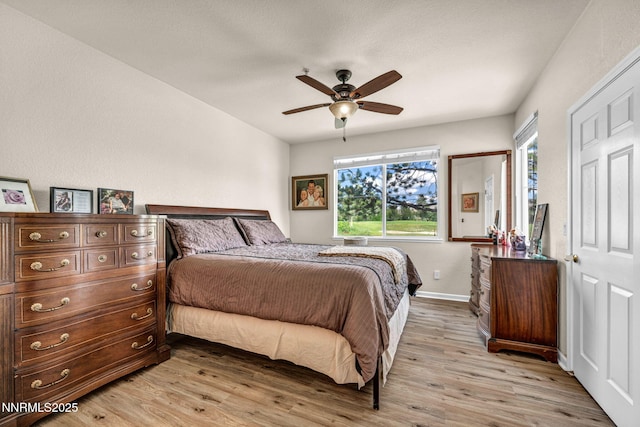 6230 Ingleston Dr Unit 212, Sparks, NV 89436 - bedroom featuring light wood finished floors and a ceiling fan