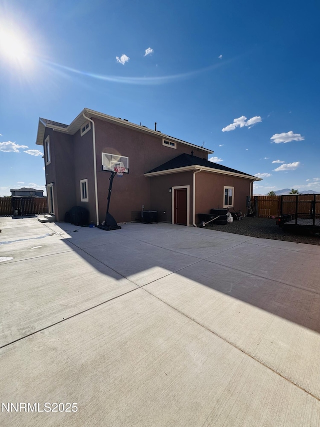 5290 Marla Dr, Winnemucca, NV 89445 - rear view of house featuring stucco siding