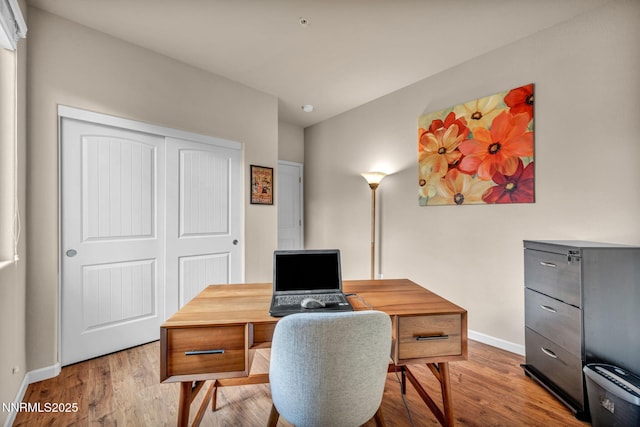 6775 Russian Thistle Dr, Sparks, NV 89436 - office area featuring baseboards and light wood finished floors