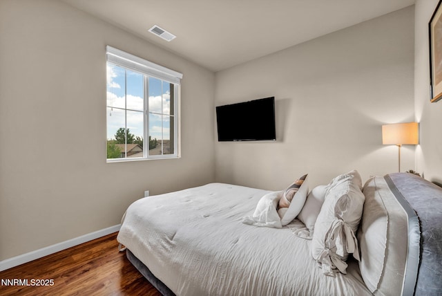 6775 Russian Thistle Dr, Sparks, NV 89436 - bedroom with baseboards and wood finished floors