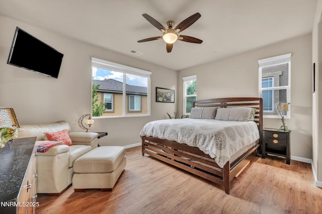 6775 Russian Thistle Dr, Sparks, NV 89436 - bedroom featuring wood finished floors and ceiling fan