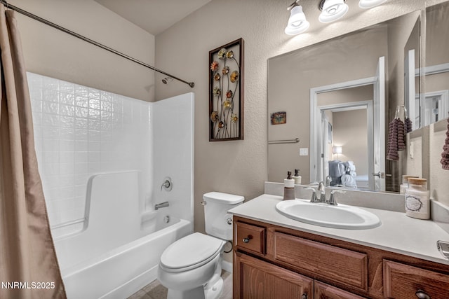 6775 Russian Thistle Dr, Sparks, NV 89436 - bathroom featuring shower / bath combo with shower curtain, vanity, and a textured wall