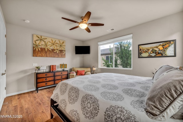 6775 Russian Thistle Dr, Sparks, NV 89436 - bedroom featuring light wood finished floors and a ceiling fan