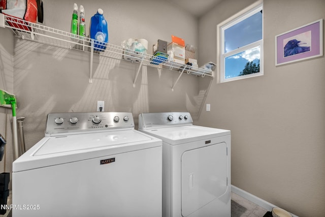 6775 Russian Thistle Dr, Sparks, NV 89436 - laundry area featuring washing machine and clothes dryer and baseboards