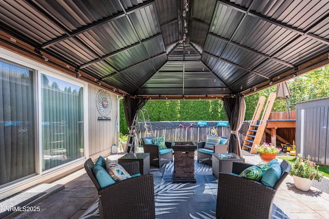 4130 Snowshoe Ln, Reno, NV 89502 - view of patio / terrace with an outdoor living space, stairway, a gazebo, and a storage shed