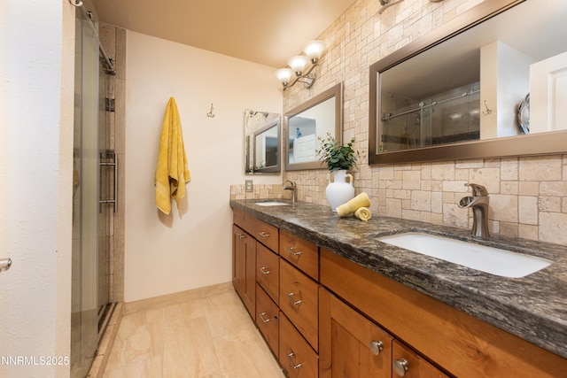 4130 Snowshoe Ln, Reno, NV 89502 - bathroom featuring double vanity, tiled shower, and tasteful backsplash