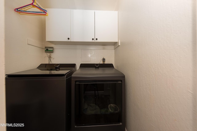 4130 Snowshoe Ln, Reno, NV 89502 - laundry area featuring washing machine and dryer and cabinet space