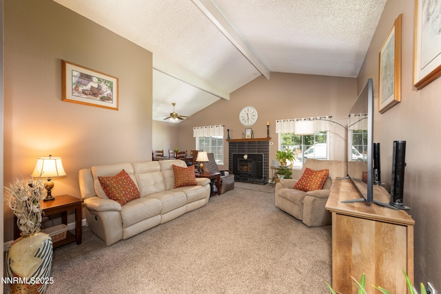 4130 Snowshoe Ln, Reno, NV 89502 - carpeted living room with beamed ceiling, ceiling fan, a brick fireplace, and high vaulted ceiling